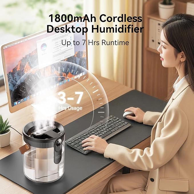 Portable dual spray humidifier on an office desk for personal workspace hydration
