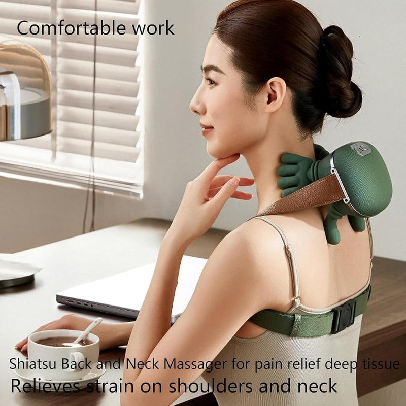Woman using a Shiatsu back and neck massager in a home office setting.