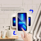 Wall-mounted waterproof phone holder with a smartphone on a tiled bathroom wall.